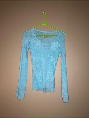 The People of the Labyrinths blue knit top